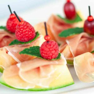 Melonenschiffchen mit Schinken, ab 12 Stk.